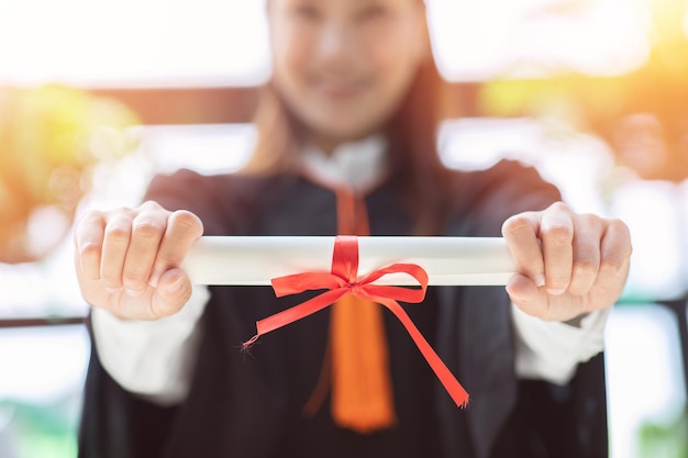 A person happily receiving a certificate of completion, symbolizing accomplishment and new opportunities.